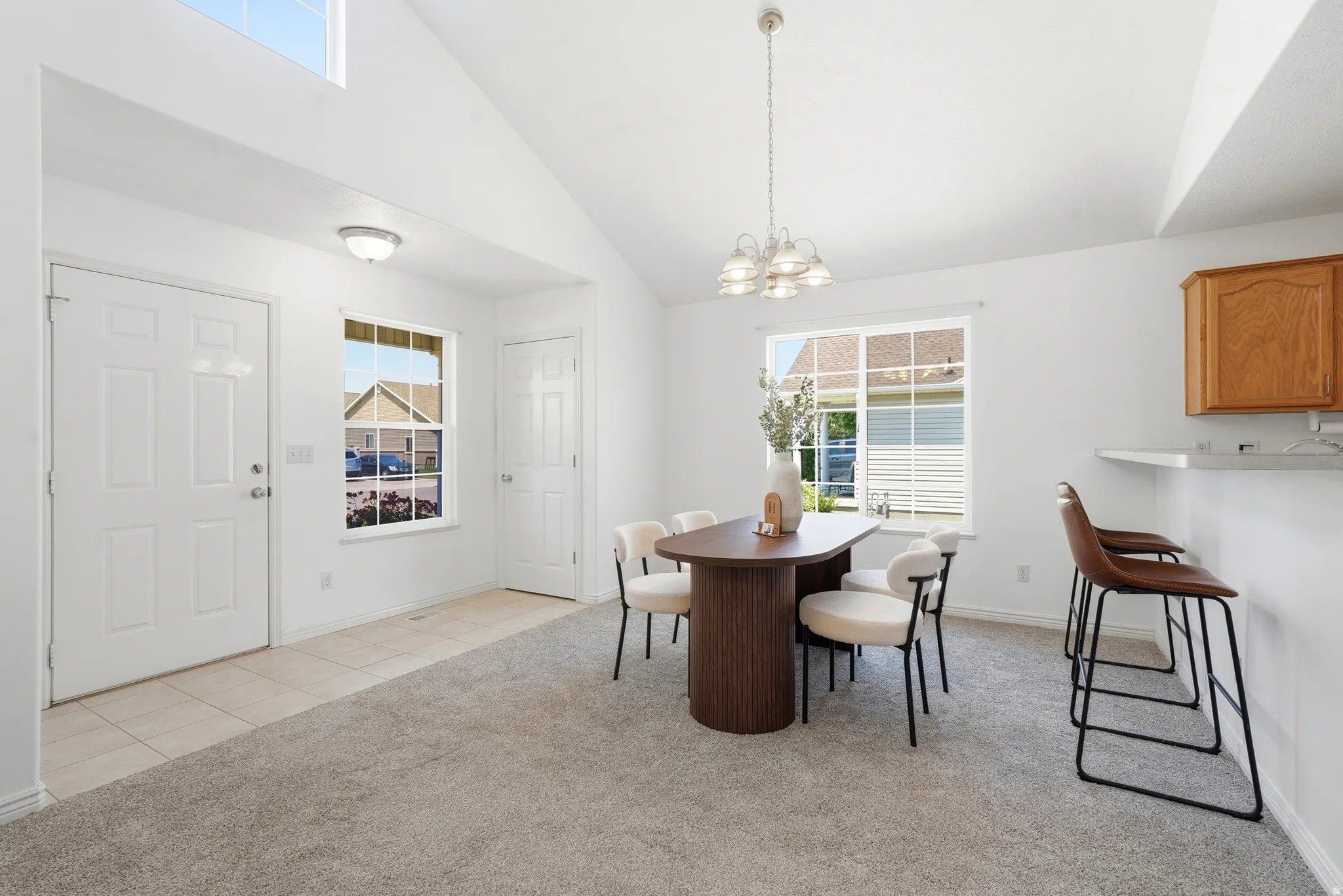 Vaulted ceiling with an upper transom window