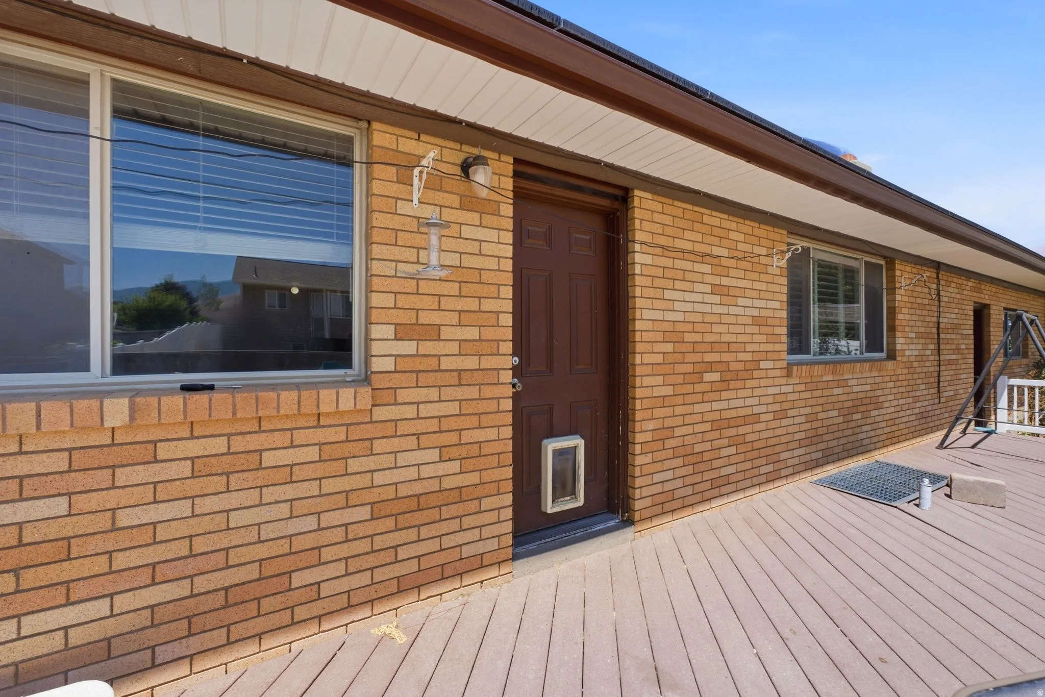 Expansive exterior deck featuring composite decking