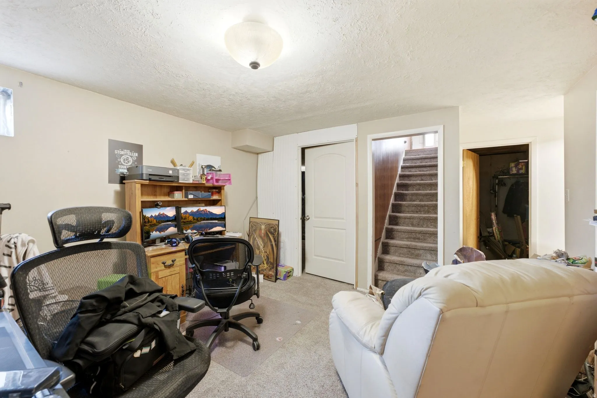 Versatile room featuring light-toned walls, carpeted flooring, and a flush mount ceiling light fixture