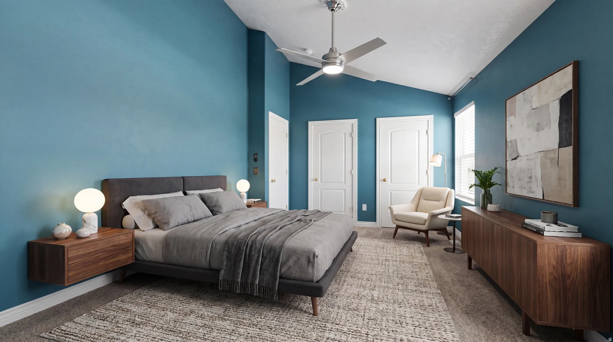Vaulted ceiling bedroom featuring a contemporary ceiling fan, multiple white paneled doors, and natural light from a window with blinds