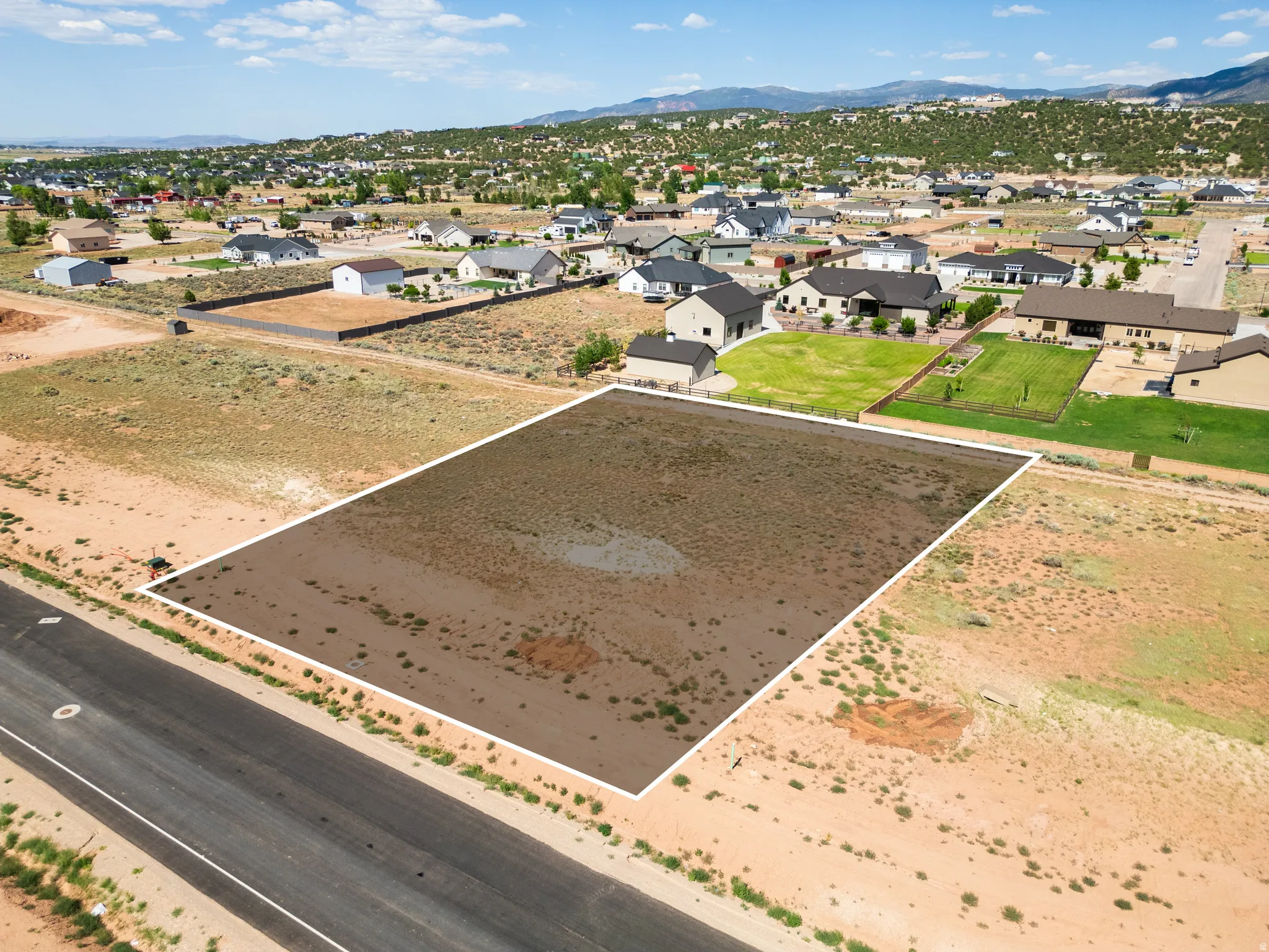 Level building lot with paved road frontage