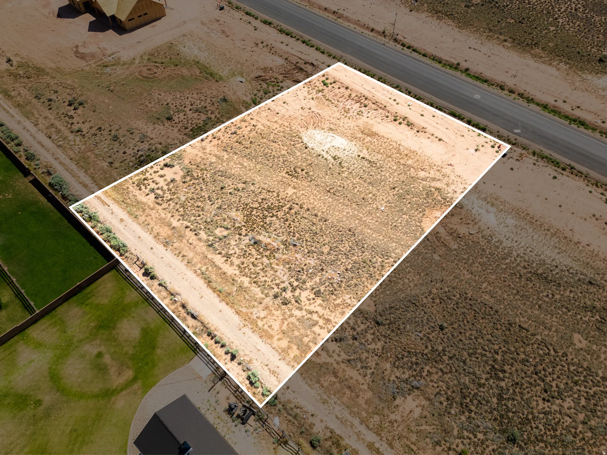 Expansive undeveloped land parcel featuring natural desert vegetation
