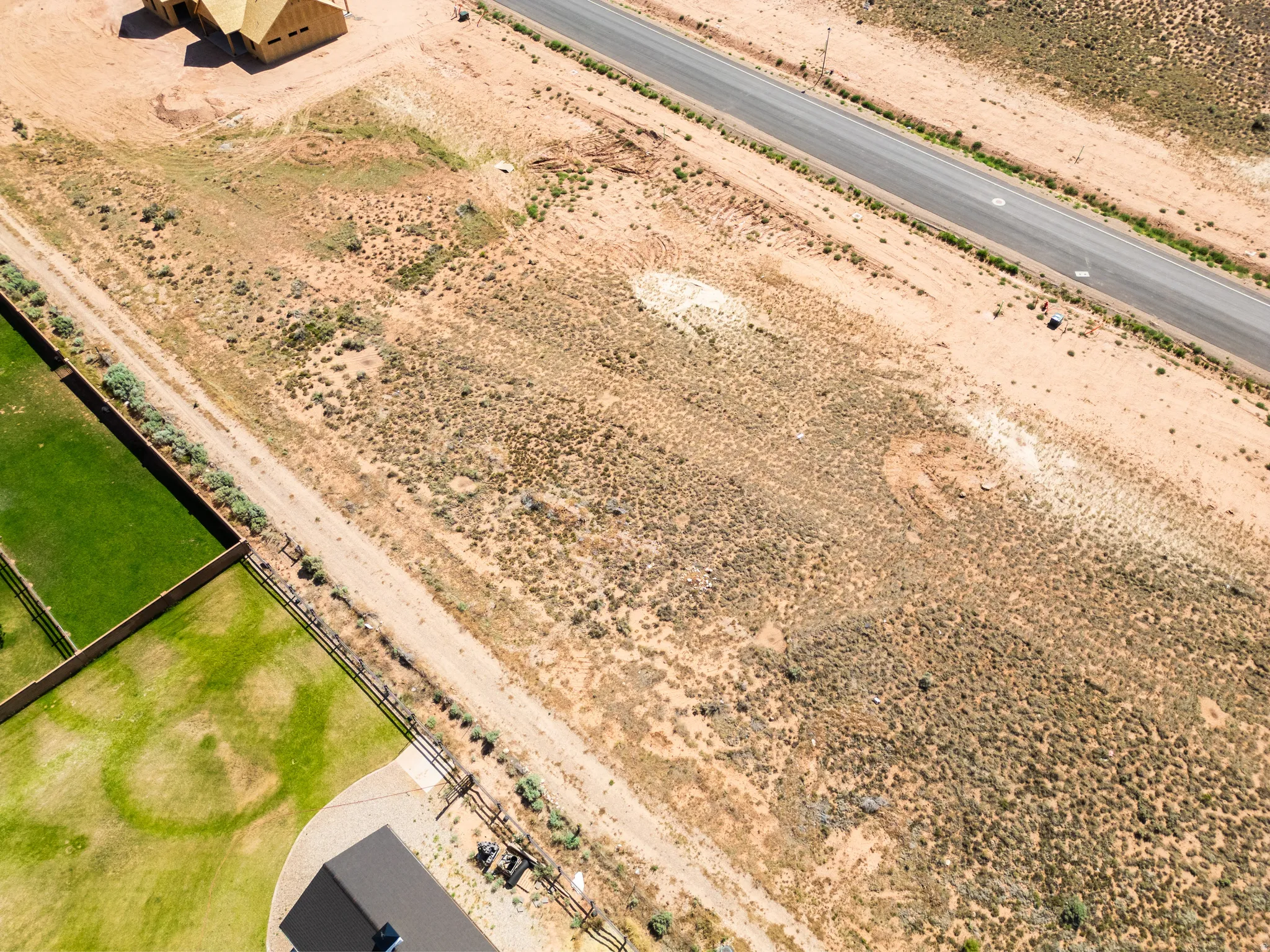 Expansive undeveloped land parcel featuring natural desert vegetation