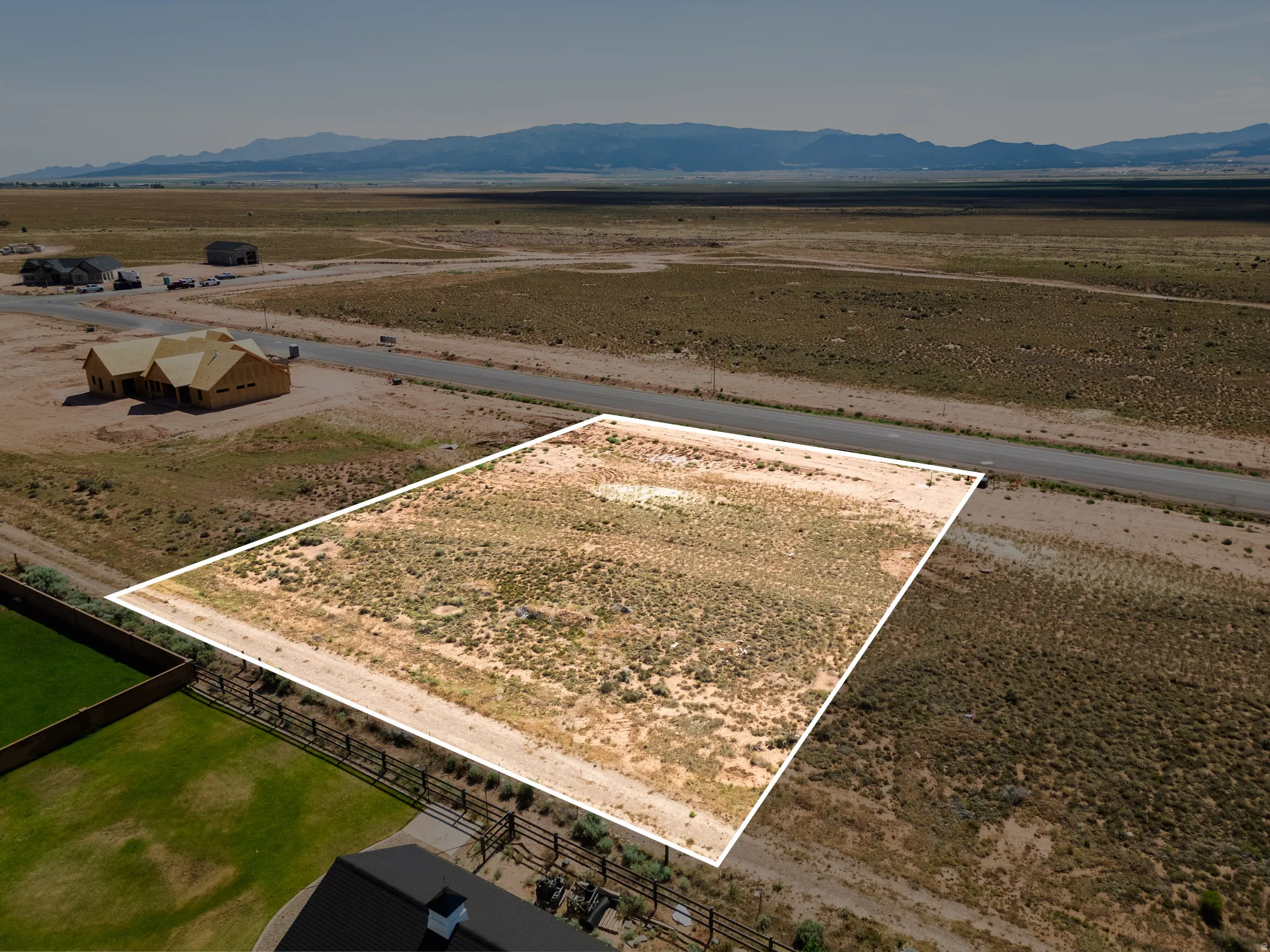 Expansive undeveloped lot with direct road frontage