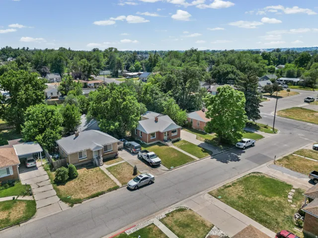 Residential neighborhood featuring mature trees and street-level curb appeal