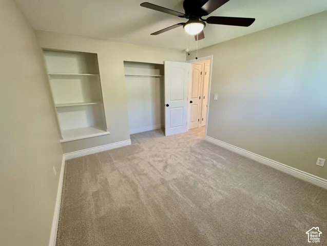 Neutral-toned carpeting throughout