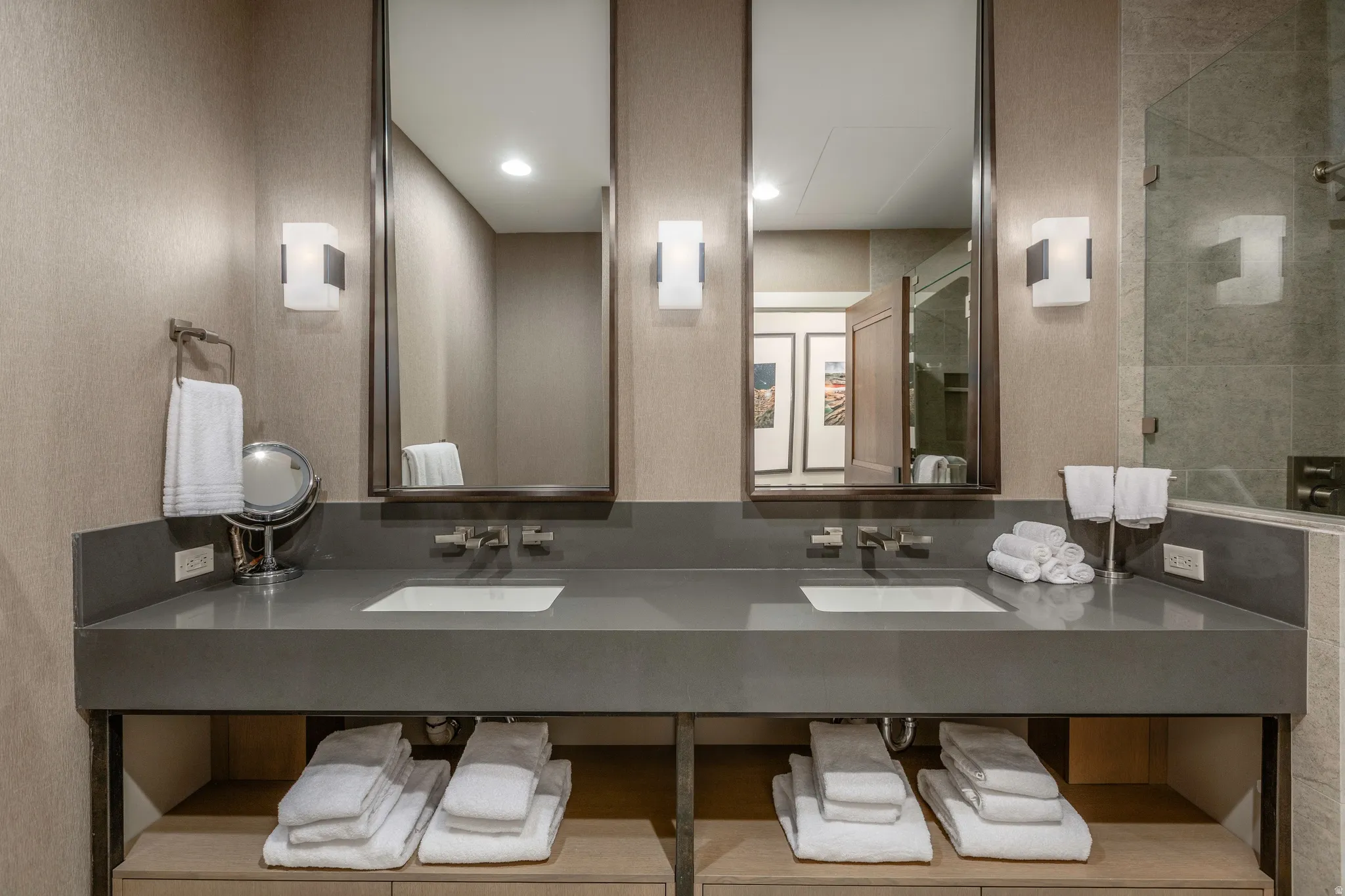 Dual vanity with integrated sinks and wall-mounted faucets