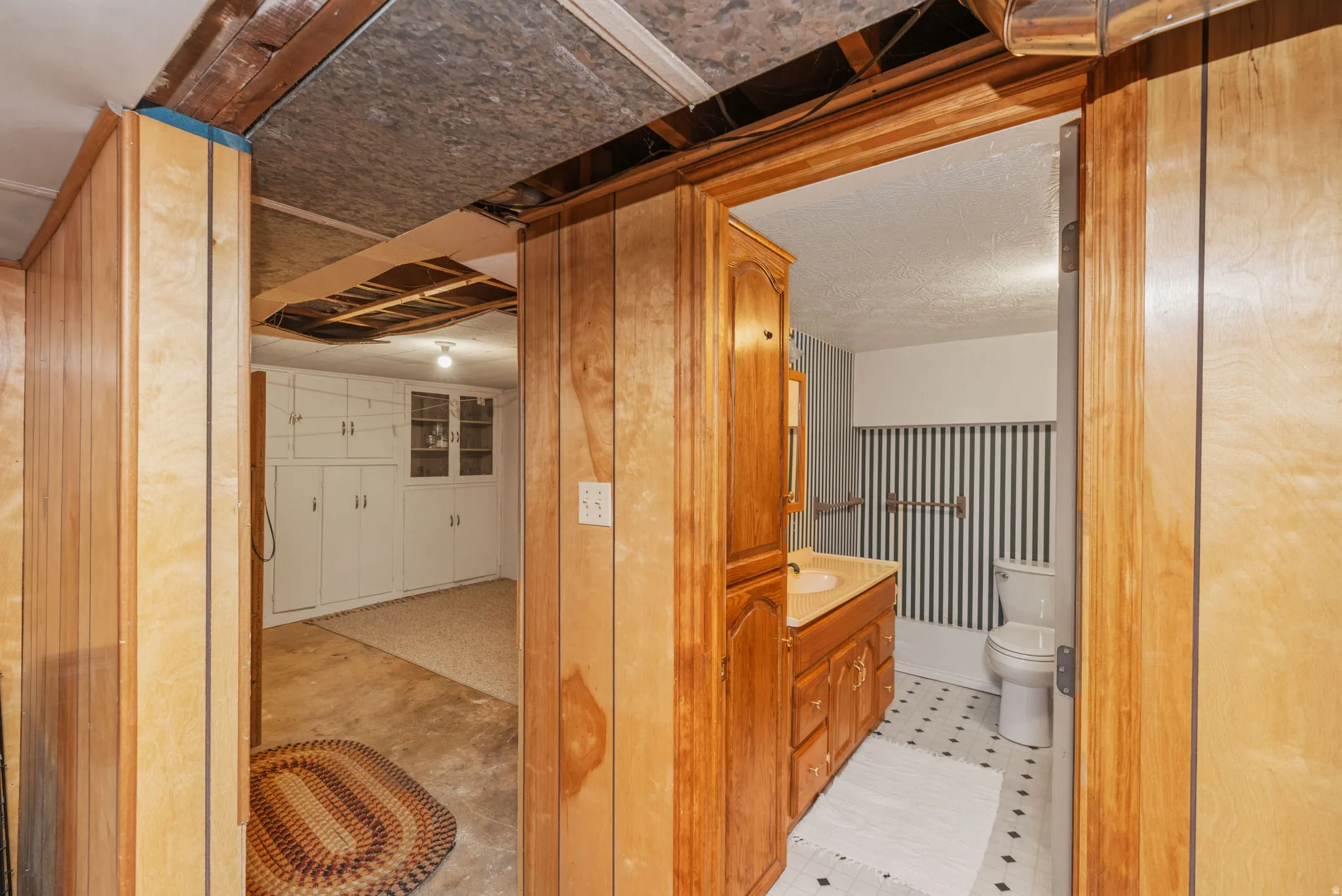1/2 Bath & Storage Room