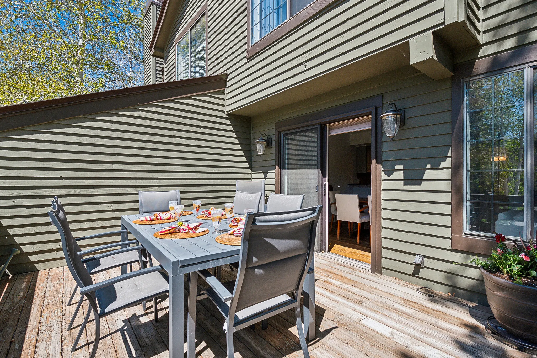 Private outdoor deck with wood flooring