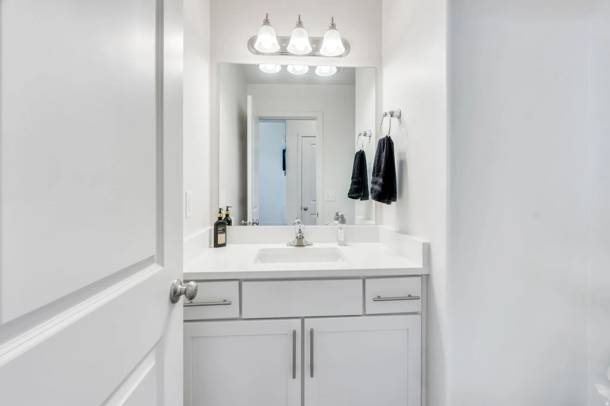 1/2 Bathroom on main floor between Kitchen and Garage.