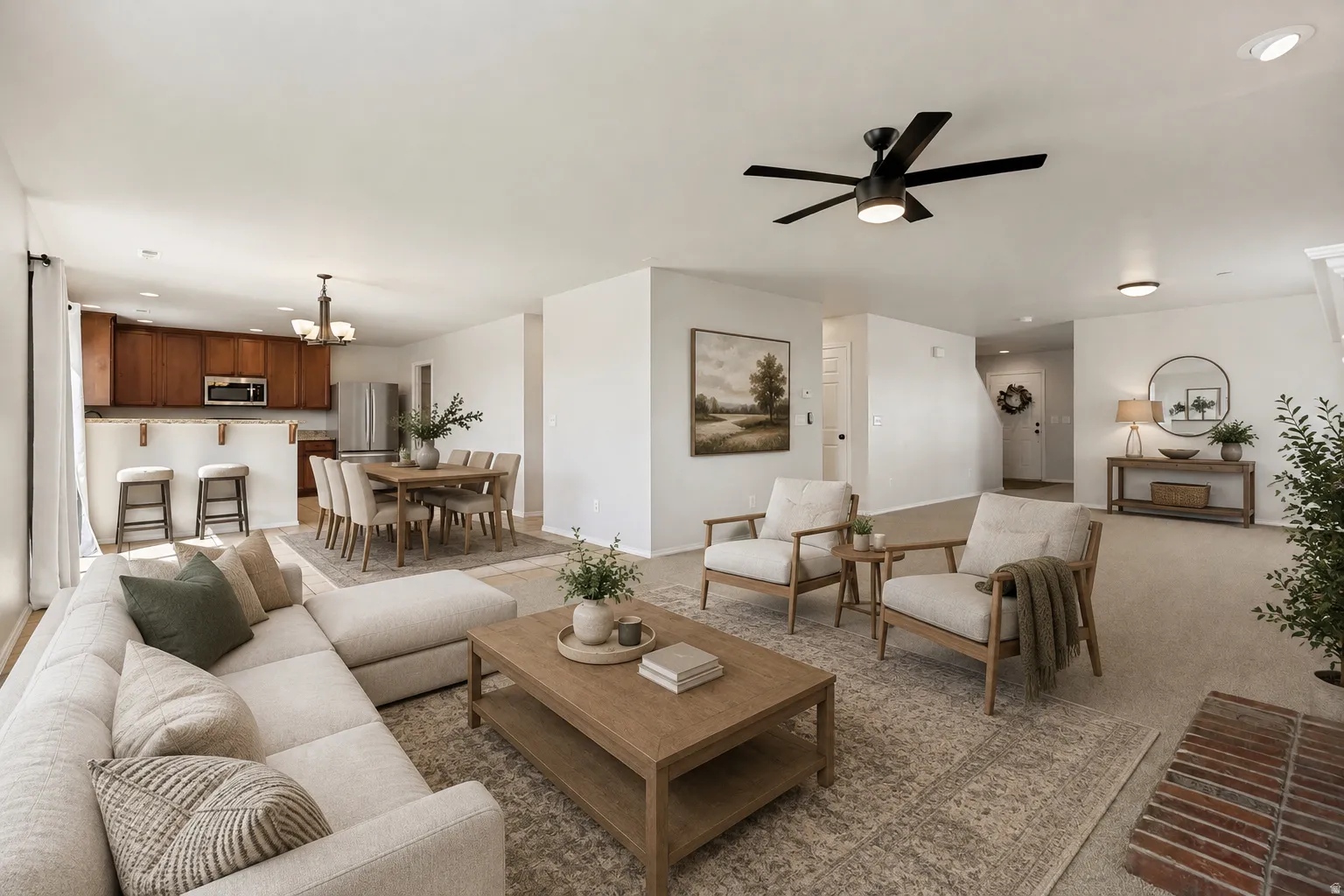 Open-concept living space featuring wood-finish flooring, a contemporary ceiling fan, and recessed lighting