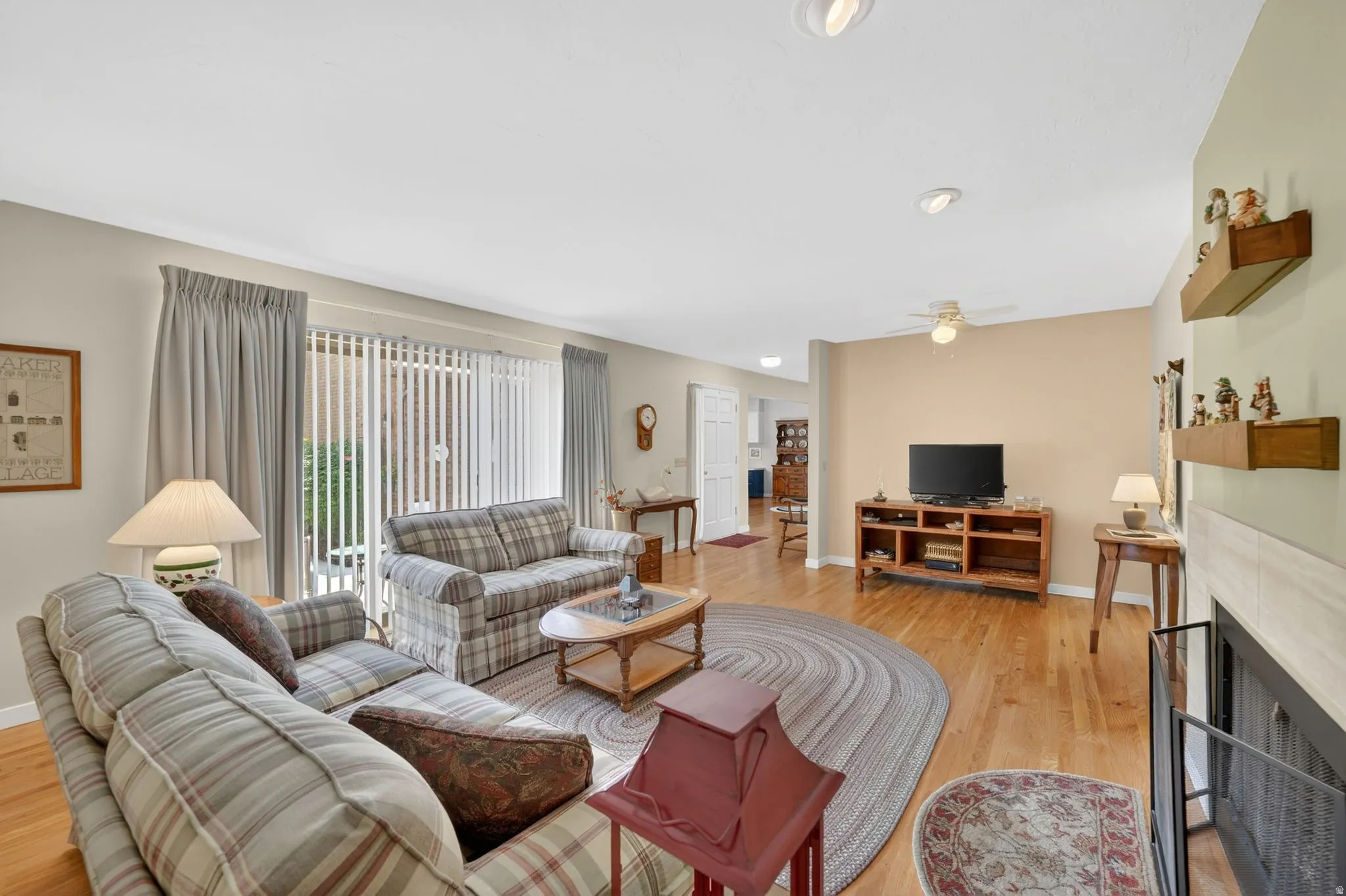 Living room featuring hardwood flooring and light-toned walls