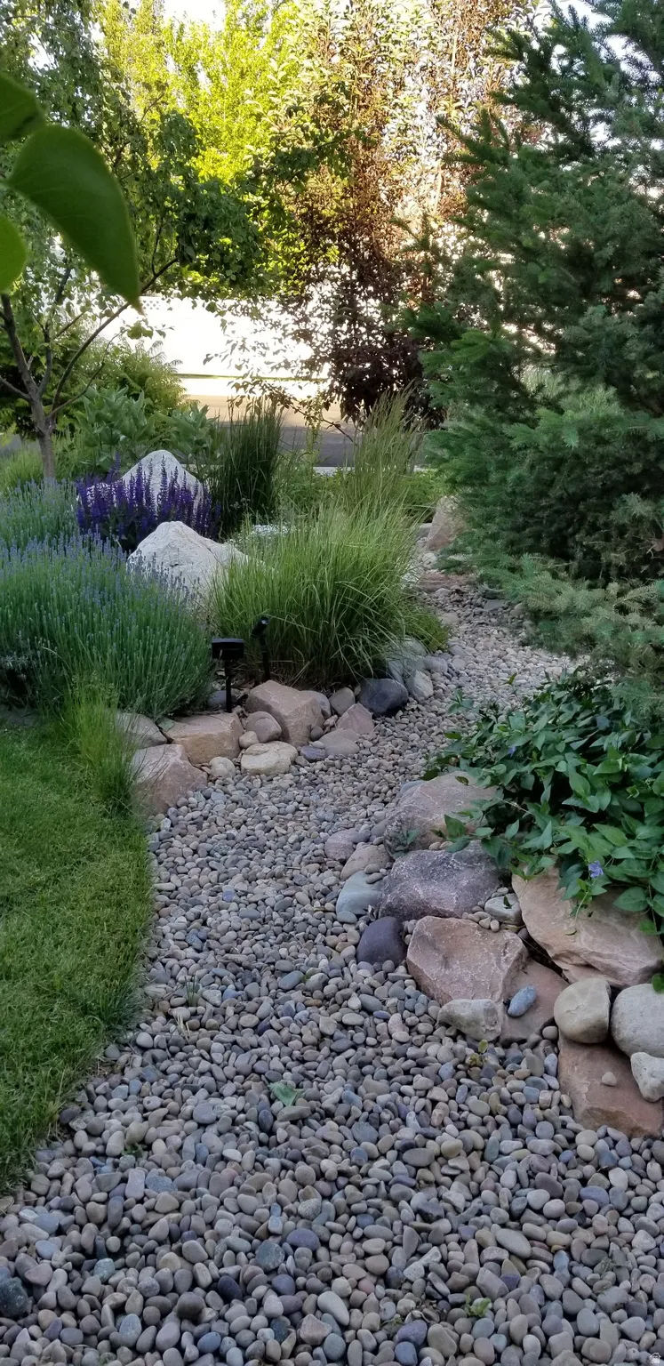 Landscaped rock bed with varied natural stones