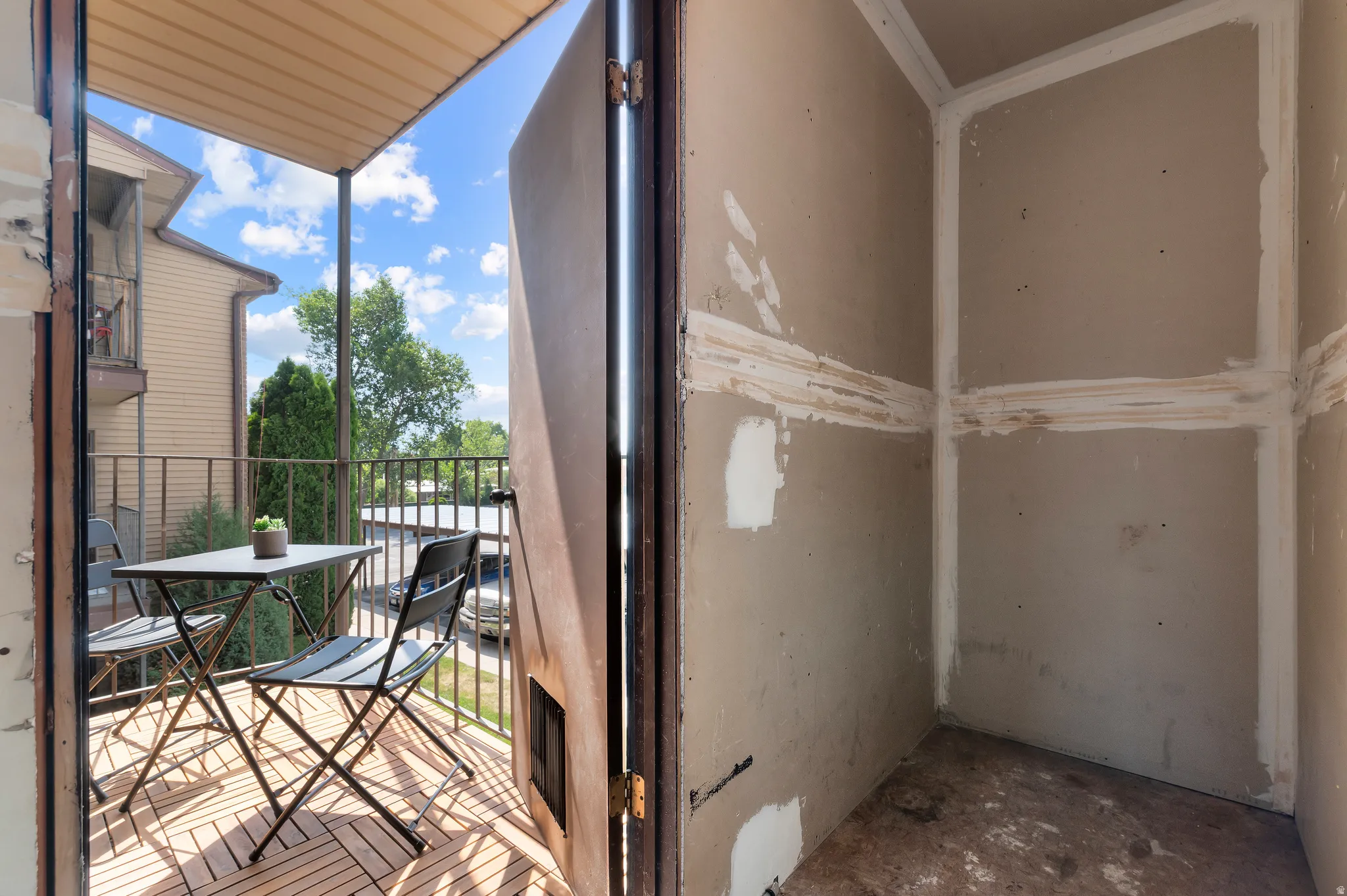 Attached storage shed/closet connected to balcony