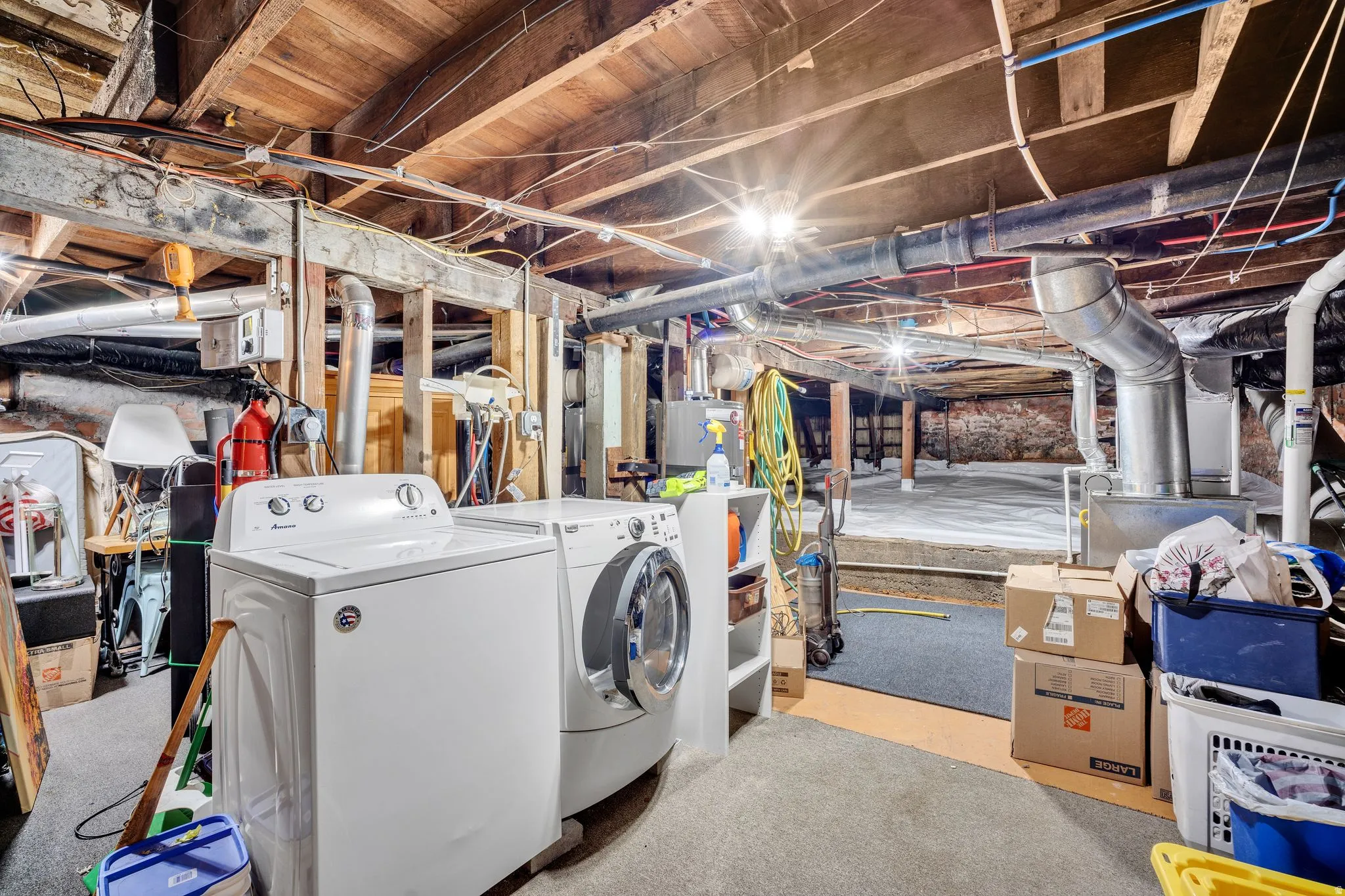 2-bedroom floorplan (614) basement laundry area and extra storage space.