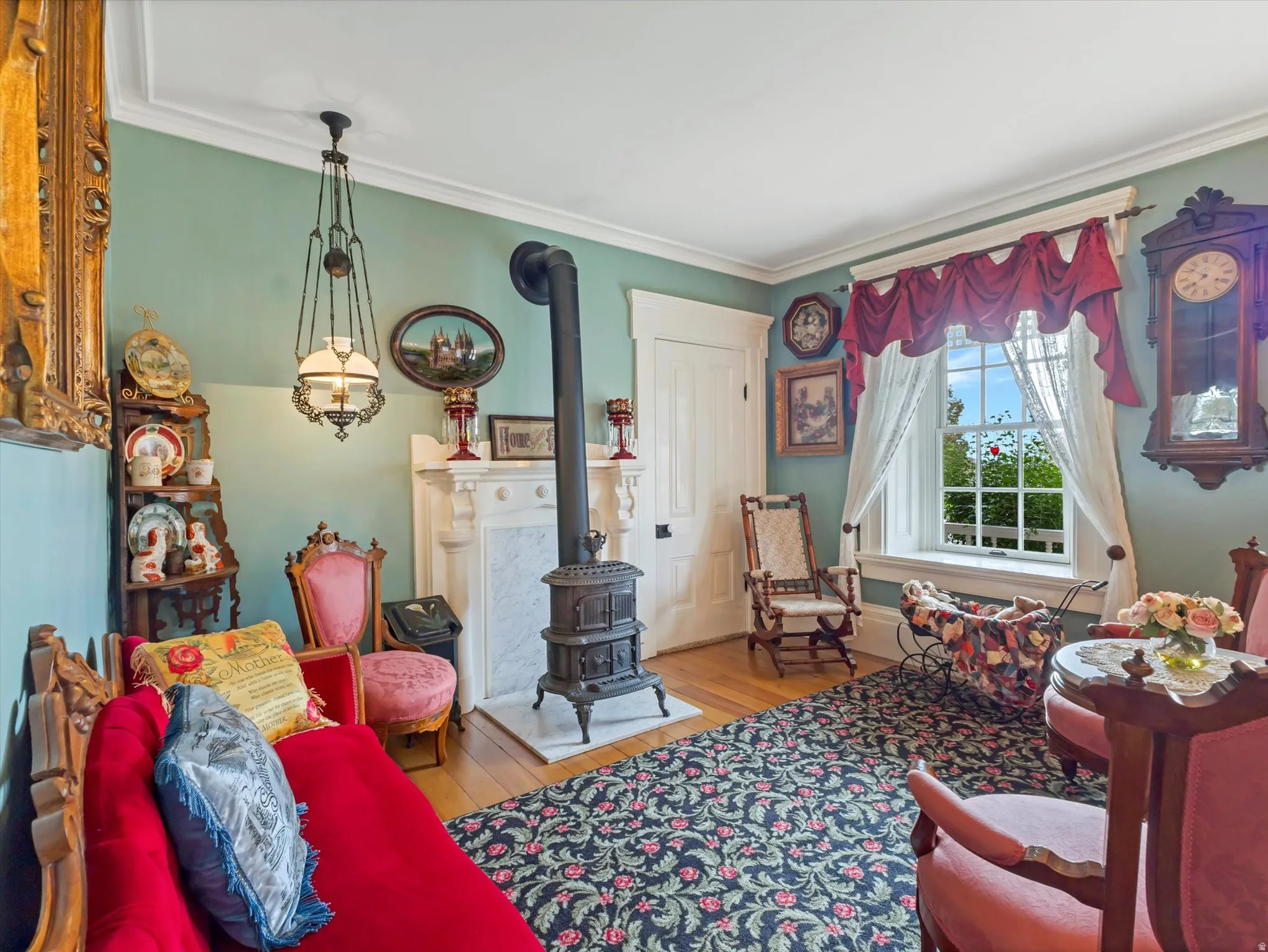 Interior space featuring hardwood flooring and crown molding