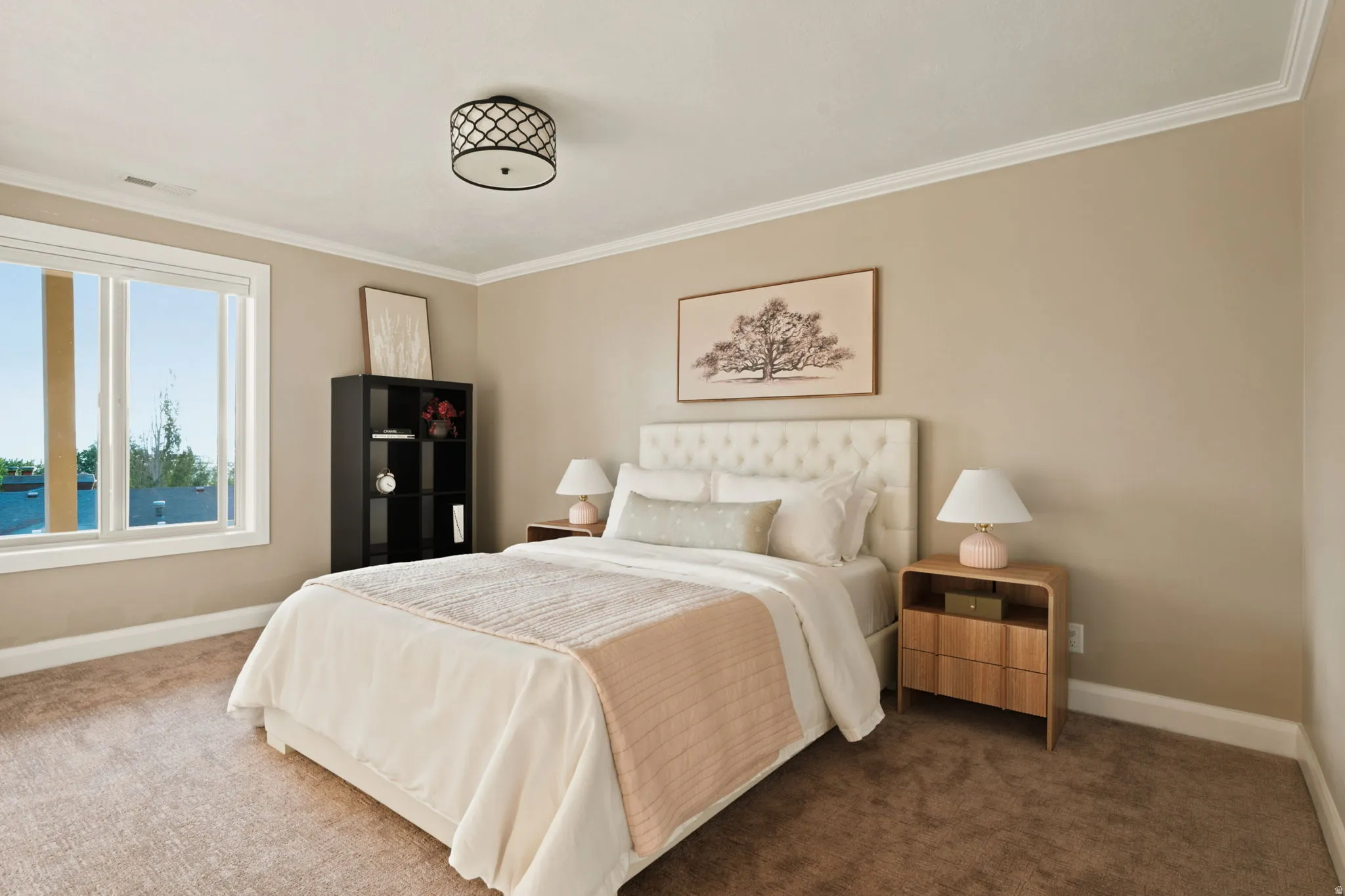 Bedroom featuring neutral wall tones, crown molding, and a drum ceiling light fixture