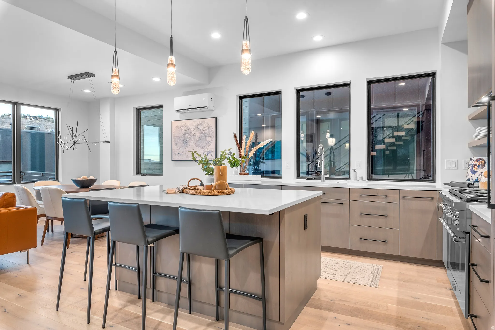 Expansive kitchen island with a light-toned countertop and integrated seating