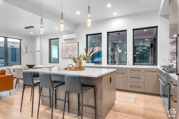 Expansive kitchen island with a light-toned countertop and integrated seating