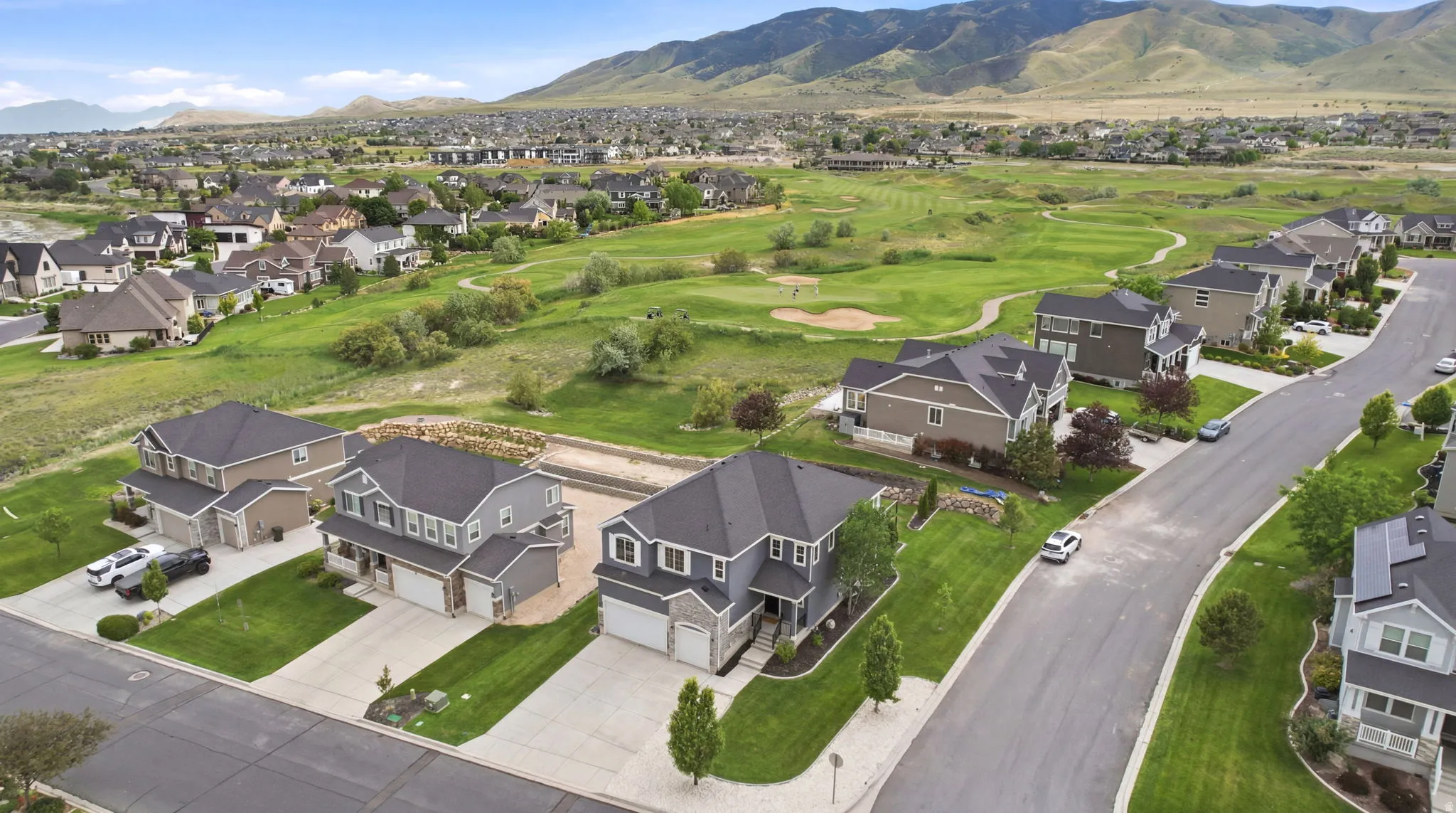 Residential neighborhood featuring multiple two-story homes with attached garages