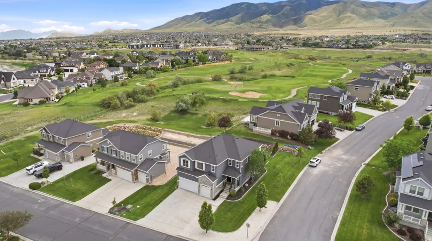 Residential neighborhood featuring multiple two-story homes with attached garages