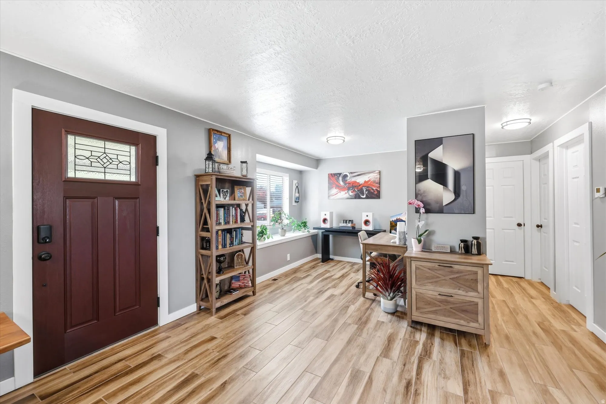 Rich wood-finish flooring throughout