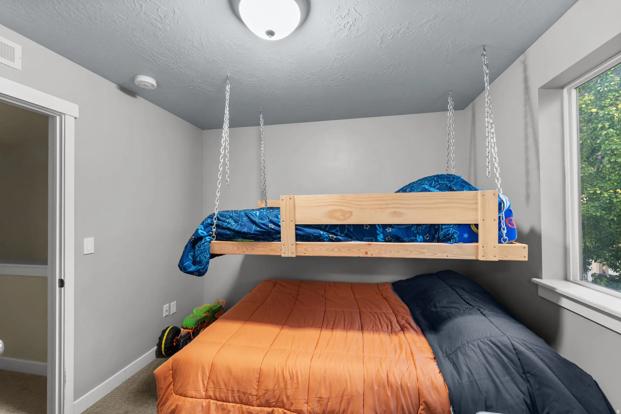 Currently set up for double bunking, the second bedroom has plenty of space for a queen sized bed while leaving room for a desk.