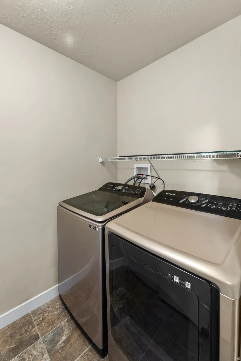 The Large Laundry area is up with the bedrooms where, lets be honest, it makes the most sense. The utility closet is conveniently located in this room as well.