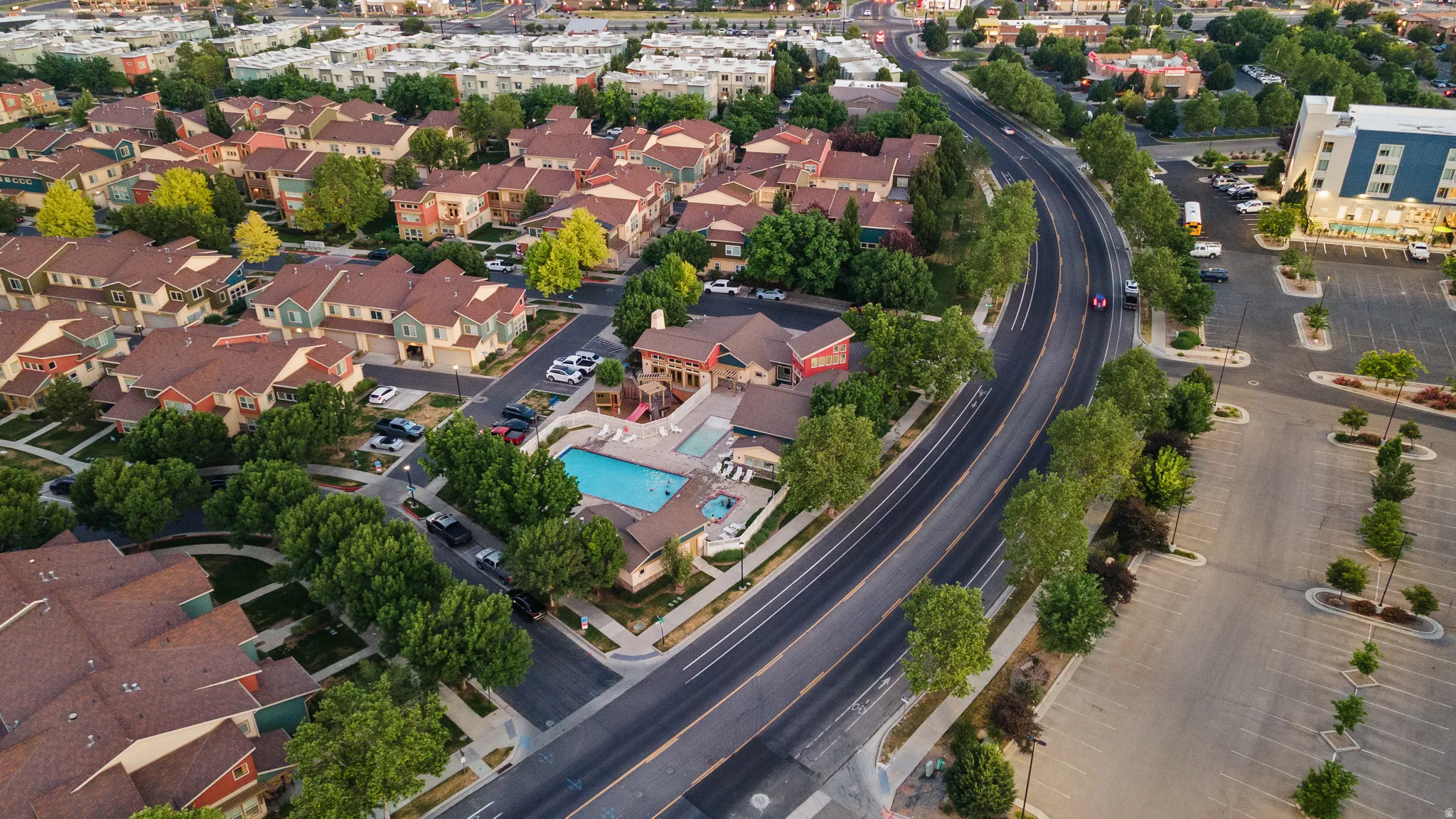 The community clubhouse offers exceptional amenities, including a 24-hour fitness center and a spacious gathering room featuring a pool table, fireplace, comfortable lounge seating, and a fully equipped kitchen. Available for private event rentals, this v