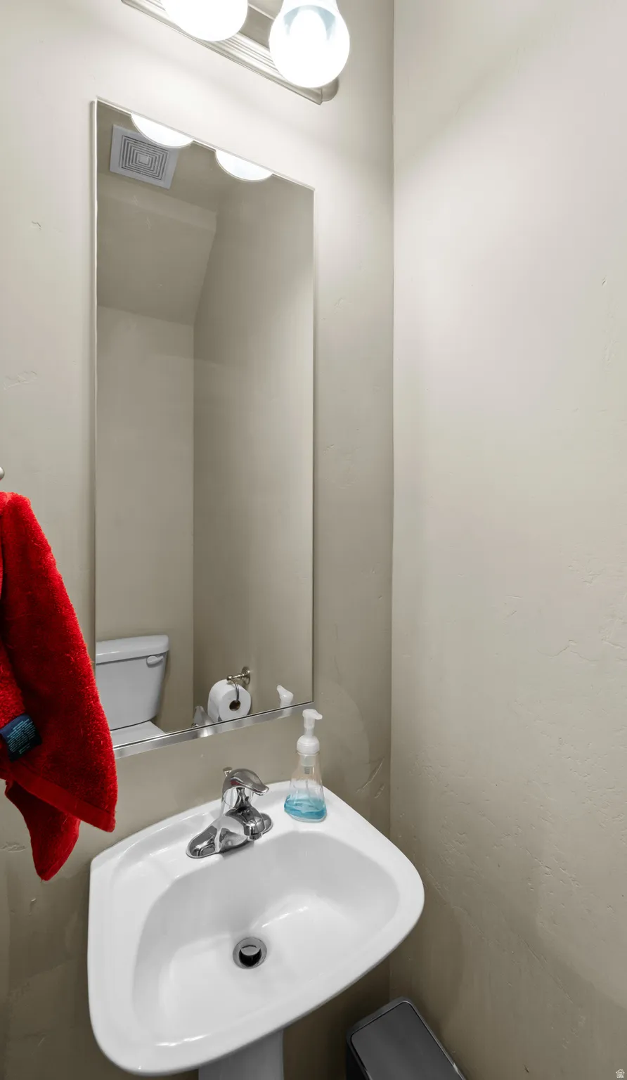 The half bath on the main floor adds convenience to the owners and visitors.