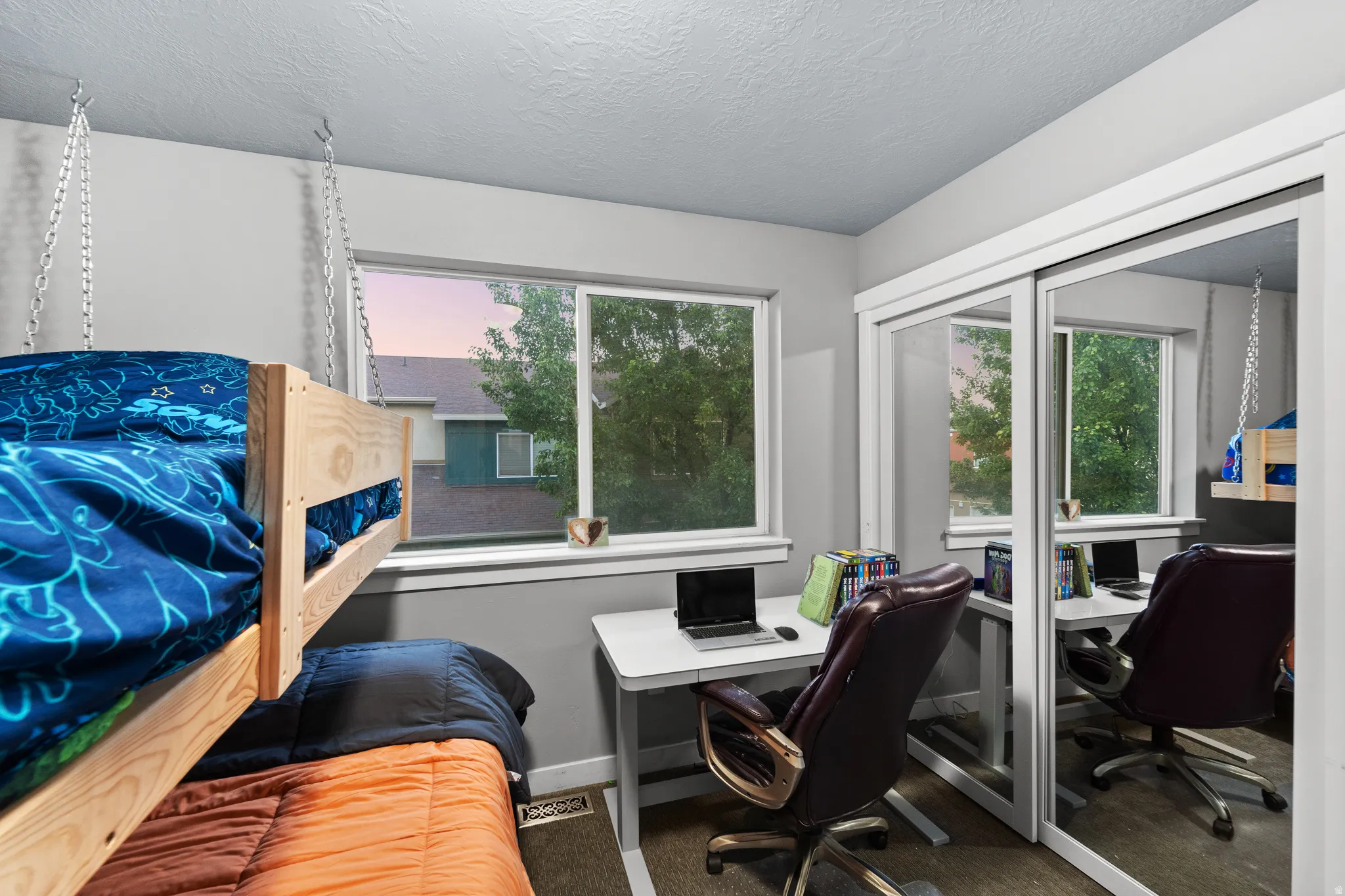 The second bedroom is south facing with a large window and lots of space.