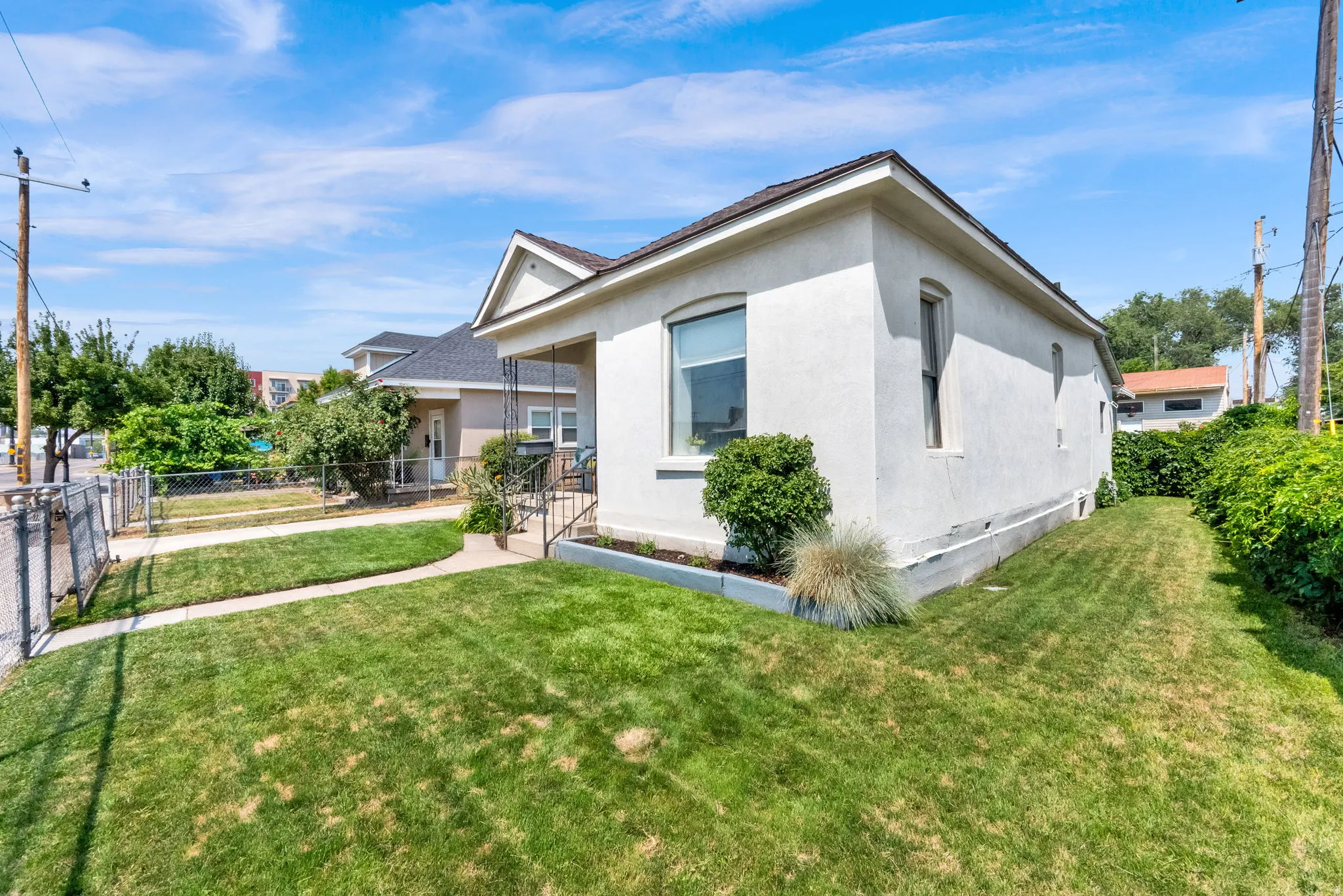 Crisp white exterior with a contrasting dark roofline