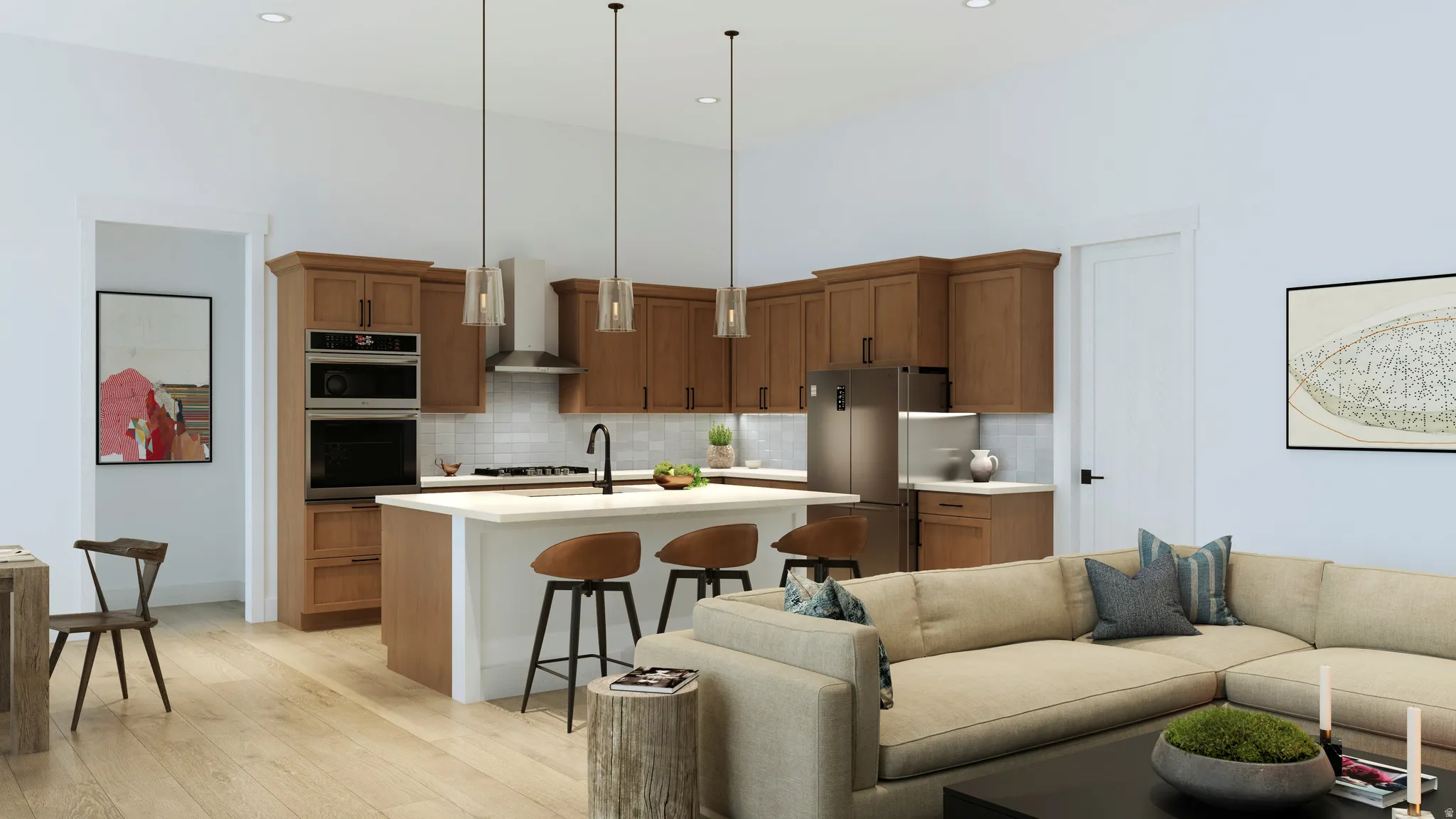 Open-concept living area featuring light wood-finish flooring