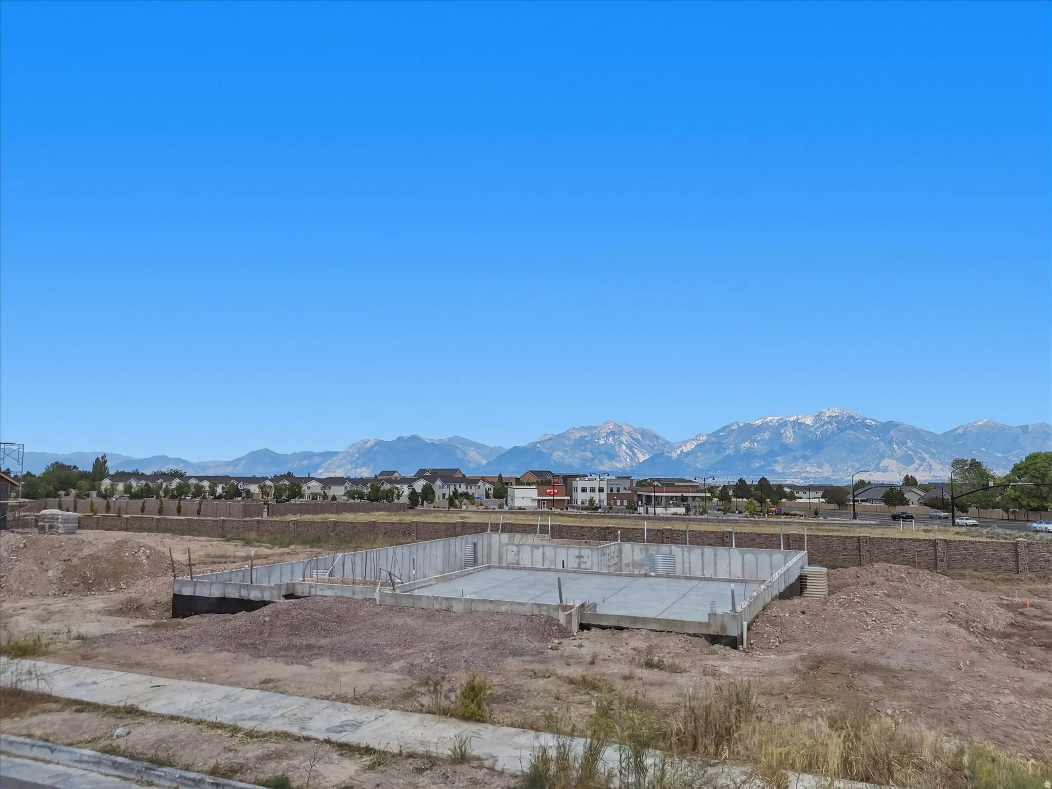 Concrete foundation with perimeter walls