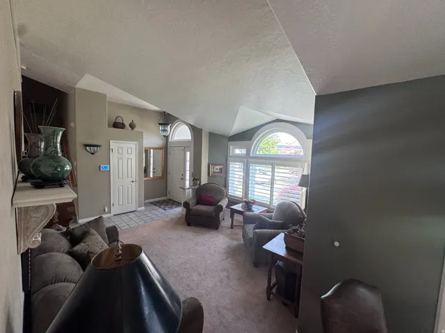 Vaulted ceiling with an arched transom window