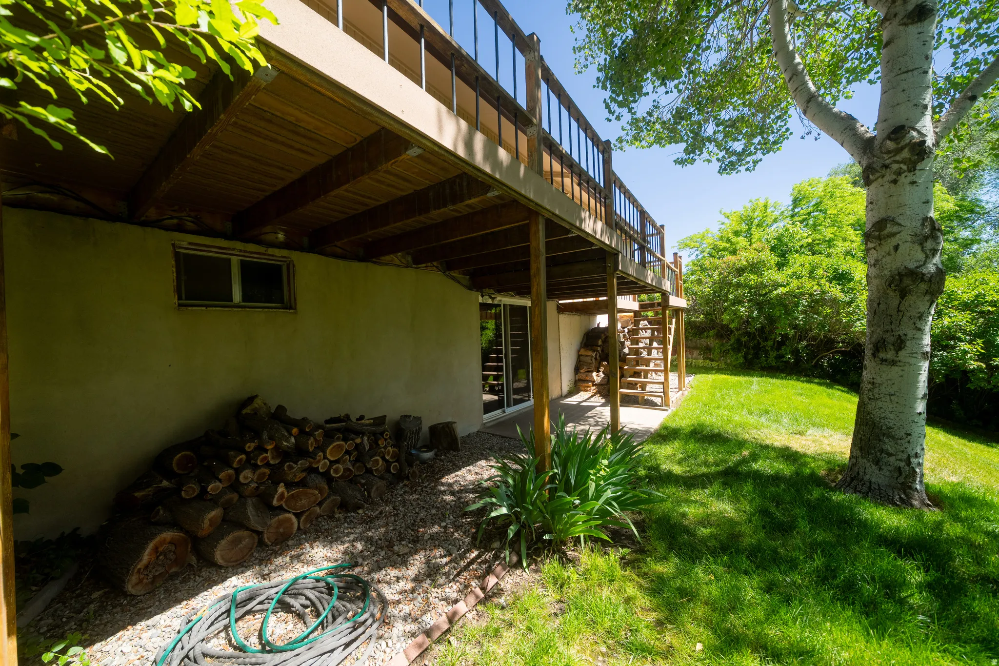 Tiered outdoor decking with wood railings