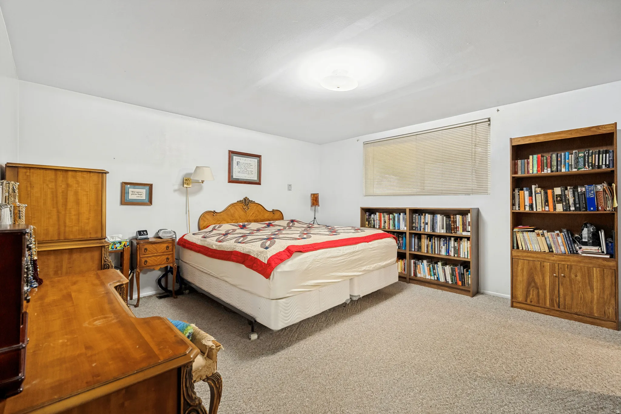 Carpeted room with white walls