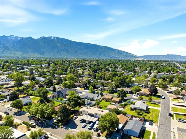 Expansive residential area featuring established homes, mature trees, and paved roadways