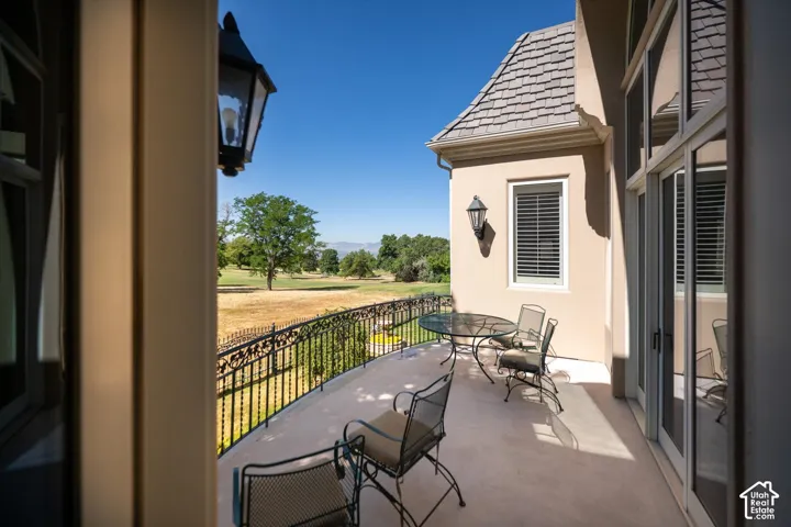 Lovely patio off kitchen and living room, overlooking Bonneville Golf Course.
