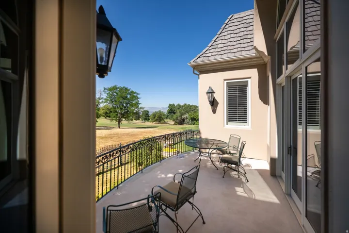 Lovely patio off kitchen and living room, overlooking Bonneville Golf Course.