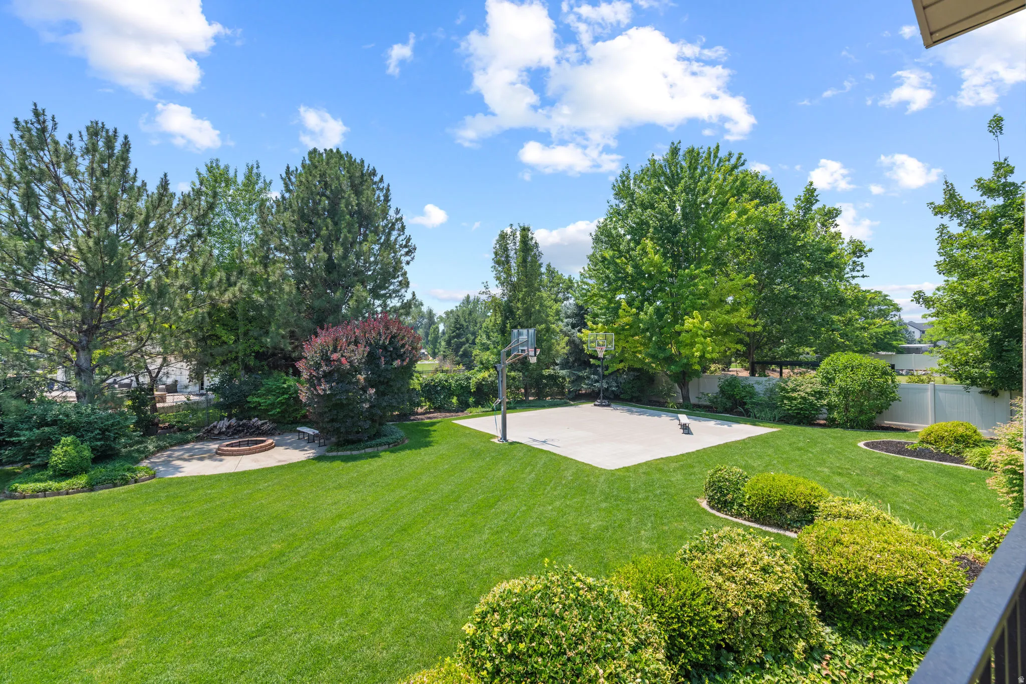 Huge 1/2 acre lot w/ basketball court, firepit, inground tramp, playground