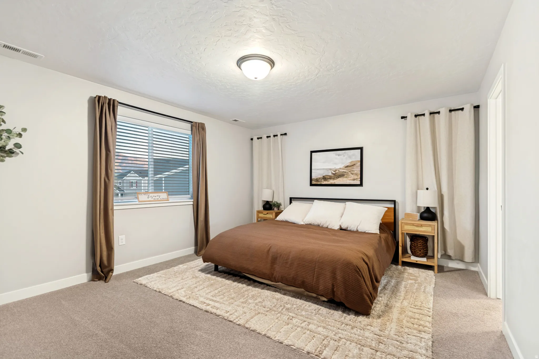 Carpeted room featuring a window with horizontal blinds, a flush mount ceiling light fixture, and white wall paint