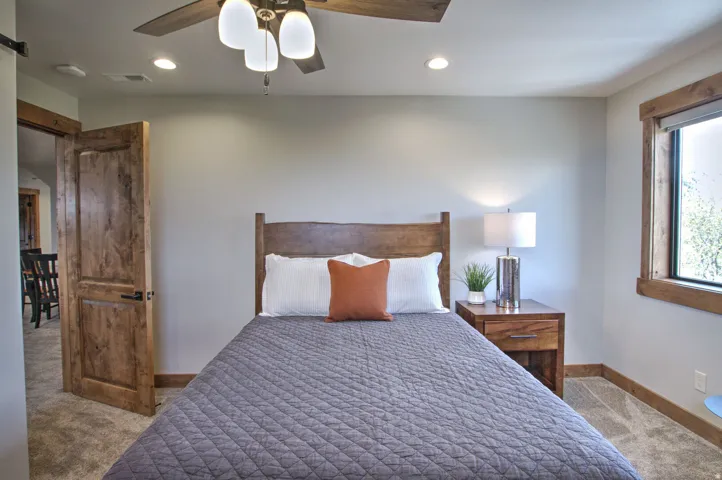 Bedroom featuring plush carpet, recessed lighting, and a ceiling fan with light kit