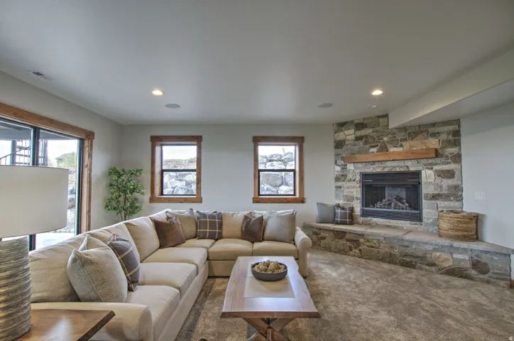 Integrated stone fireplace with hearth seating