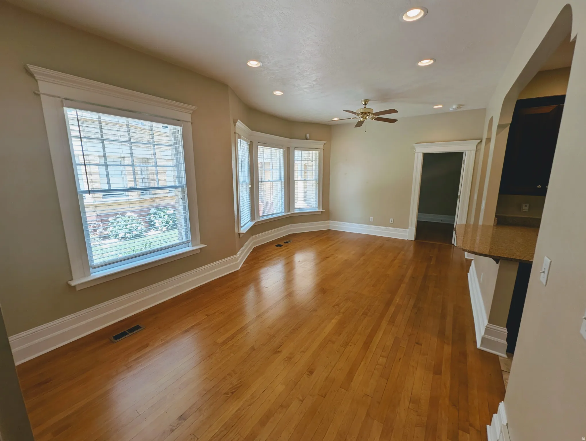 Hardwood flooring throughout the main living space