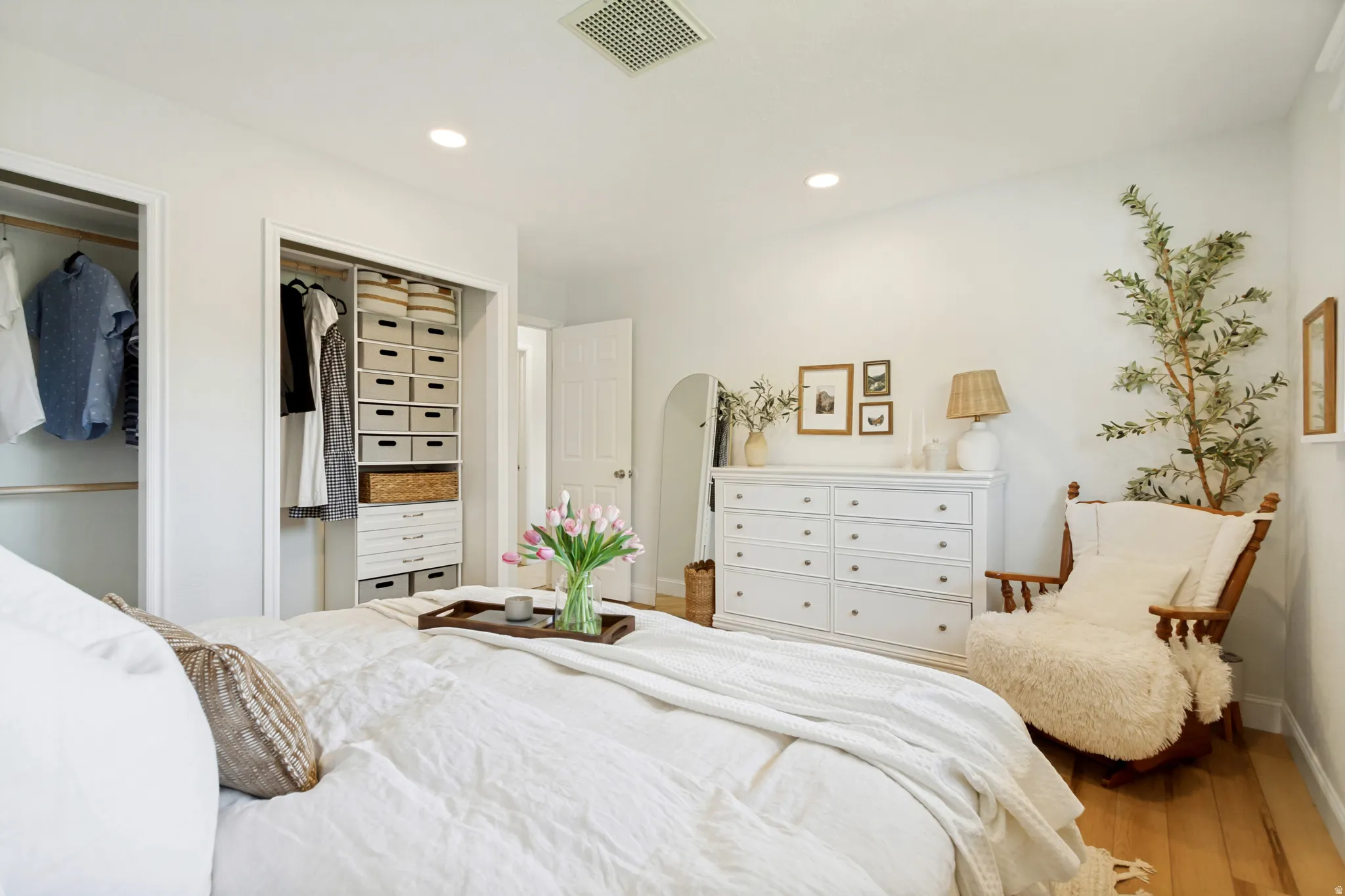 Bedroom featuring recessed lighting, light wood-finish flooring, and white walls