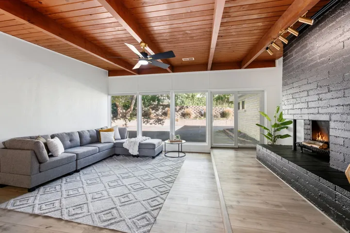 Wood-beamed ceiling with a ceiling fan