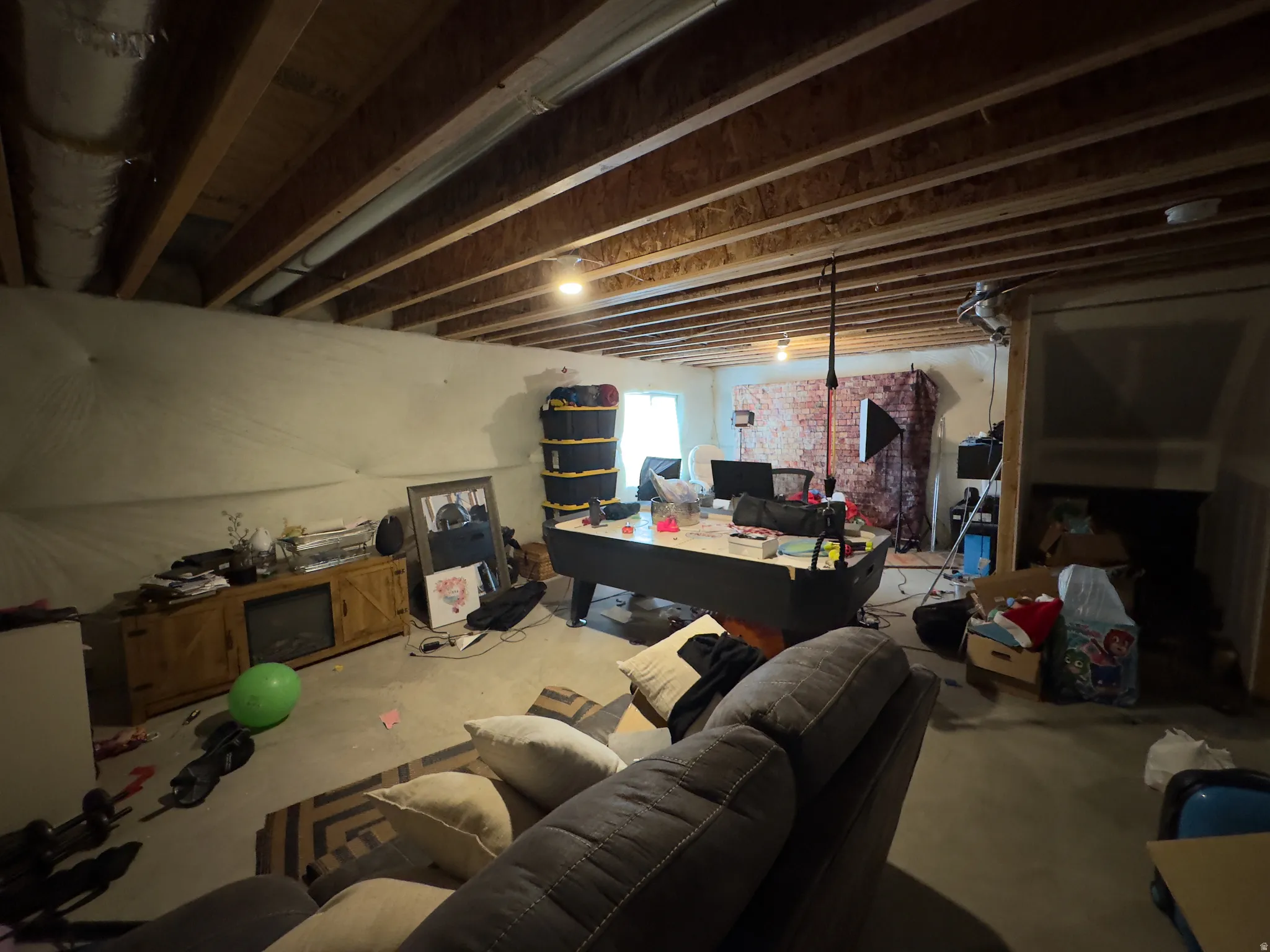 Unfinished basement offering substantial square footage for future development