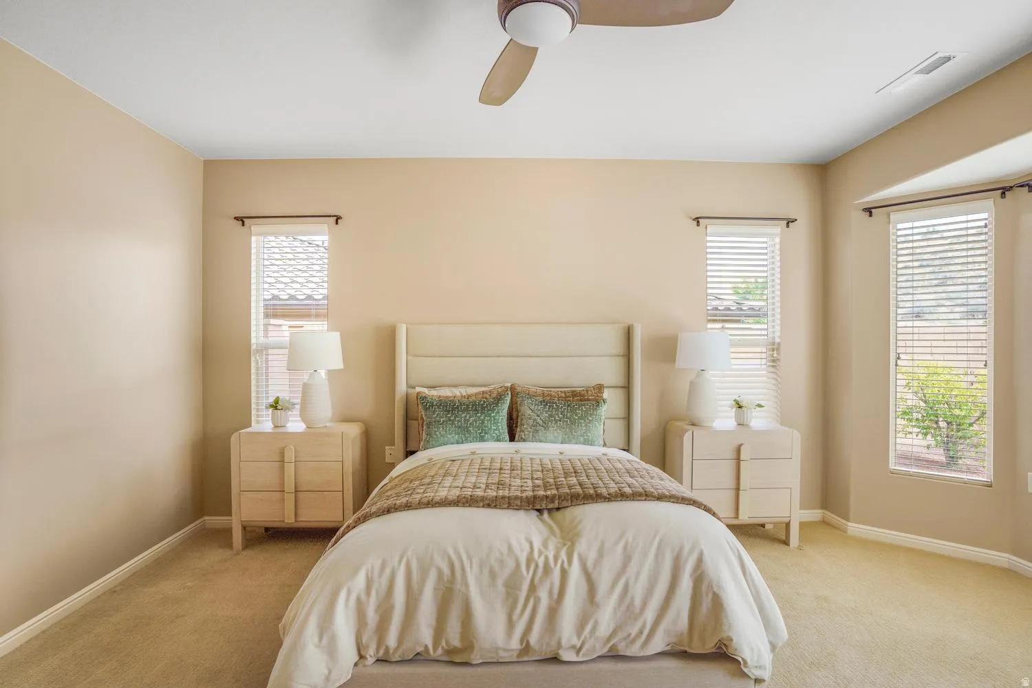 Recessed lighting, ceiling fan, and carpeted flooring