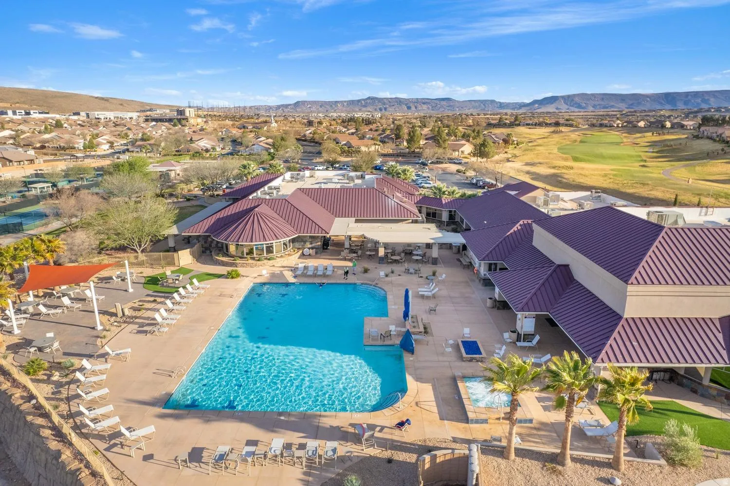 Expansive outdoor pool with integrated spa